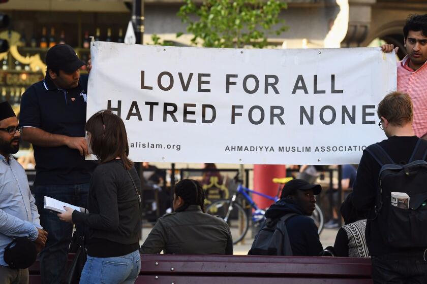 MANCHESTER, ENGLAND - MAY 23: Members of the Muslim community attend a candlelit vigil, to honour the victims of Monday evening's terror attack, at Albert Square on May 23, 2017 in Manchester, England. Monday's explosion occurred at Manchester Arena as concert goers were leaving the venue after Ariana Grande had just finished performing. Greater Manchester Police are treating the explosion as a terrorist attack and have confirmed 22 fatalities and 59 injured. (Photo by Jeff J Mitchell/Getty Images) ** OUTS - ELSENT, FPG, CM - OUTS * NM, PH, VA if sourced by CT, LA or MoD **