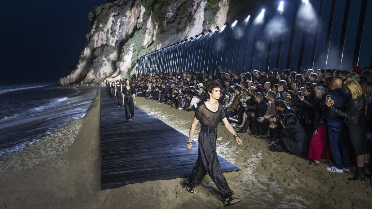 The finale of the Saint Laurent spring/summer 2020 menswear runway show presented on June 6, 2019, on the beach at Paradise Cove in Malibu.