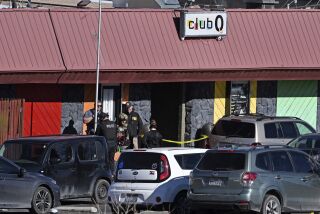 Colorado Springs police, the FBI and others investigate the scene of a shooting at Club Q on Sunday, Nov. 20, 2022 