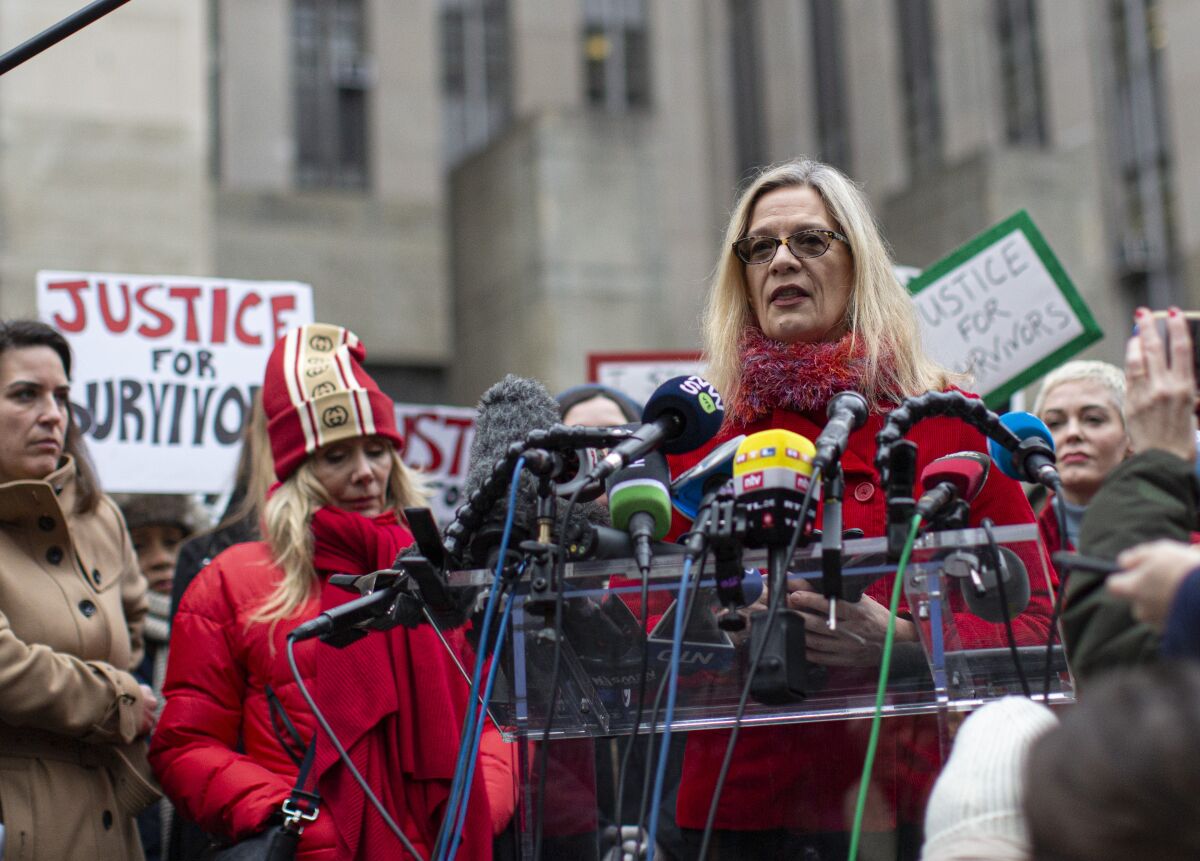 Actress Louise Godbold, who has accused Harvey Weinstein of sexual misconduct, speaks to reporters outside a courthouse on Monday in New York City.