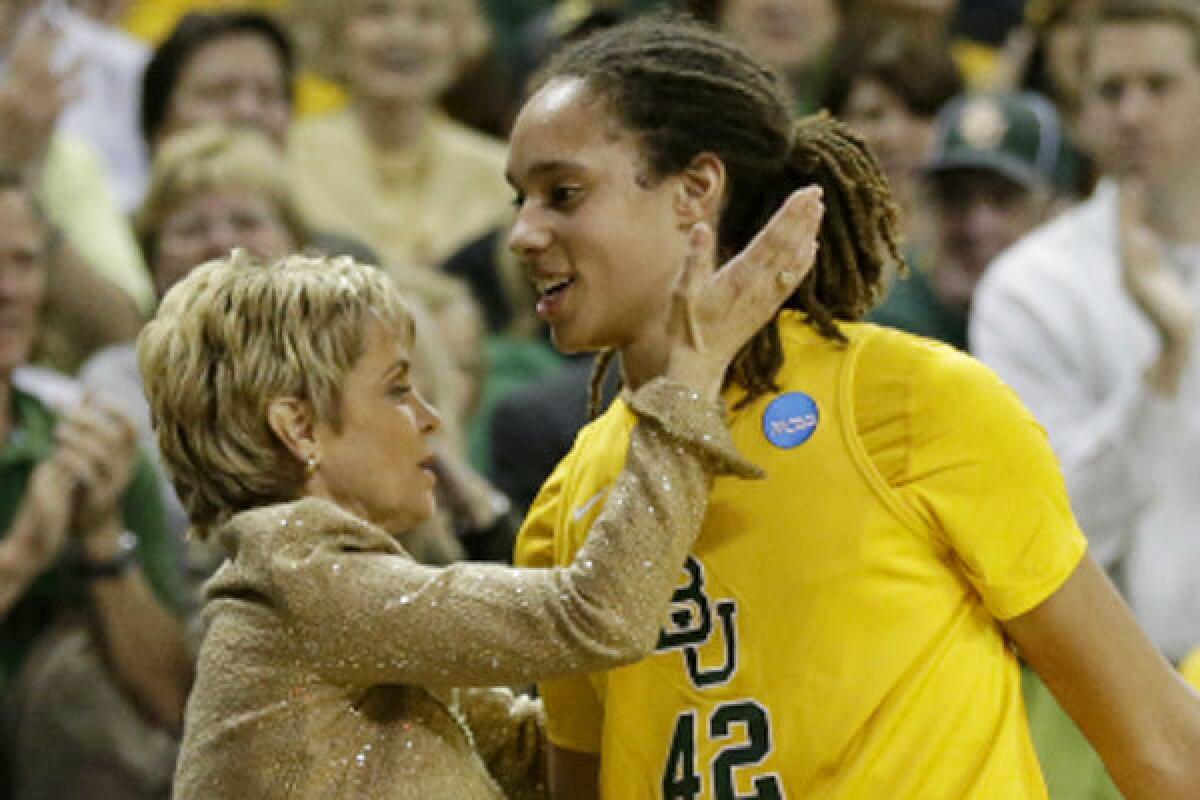 Baylor Coach Kim Mulkey embraces then-Bears star Brittney Griner in March 2013.