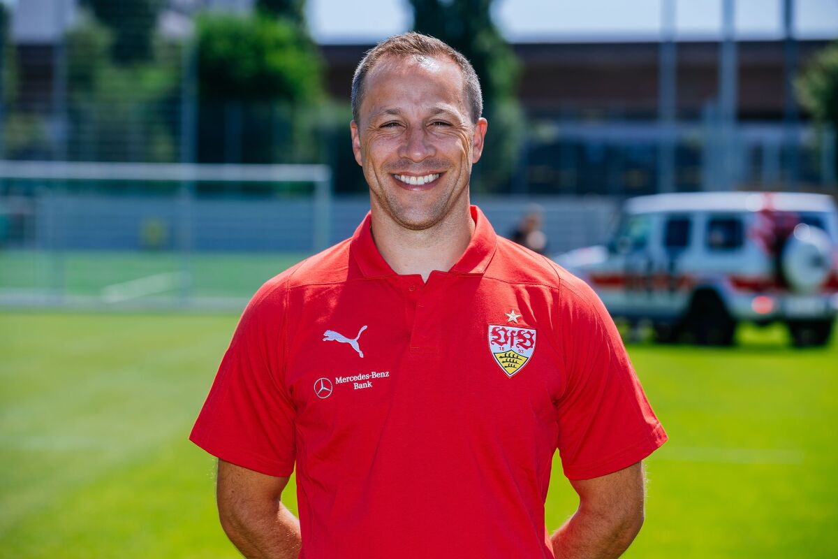 Steven Cherundolo poses for a photo during his time as an assistant coach with VfB Stuttgart in 2018.