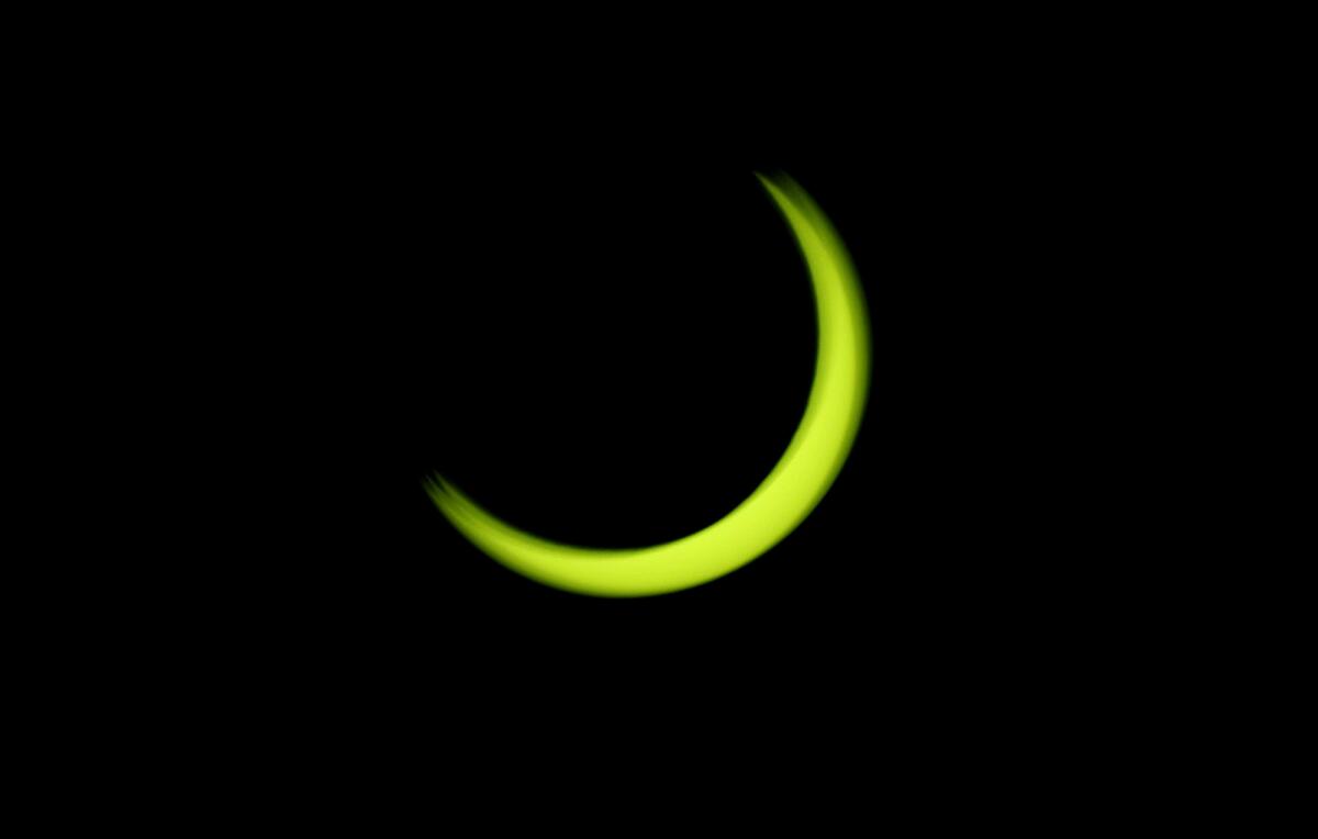 The so-called annular eclipse leaves a thin outer ring of the sun visible.