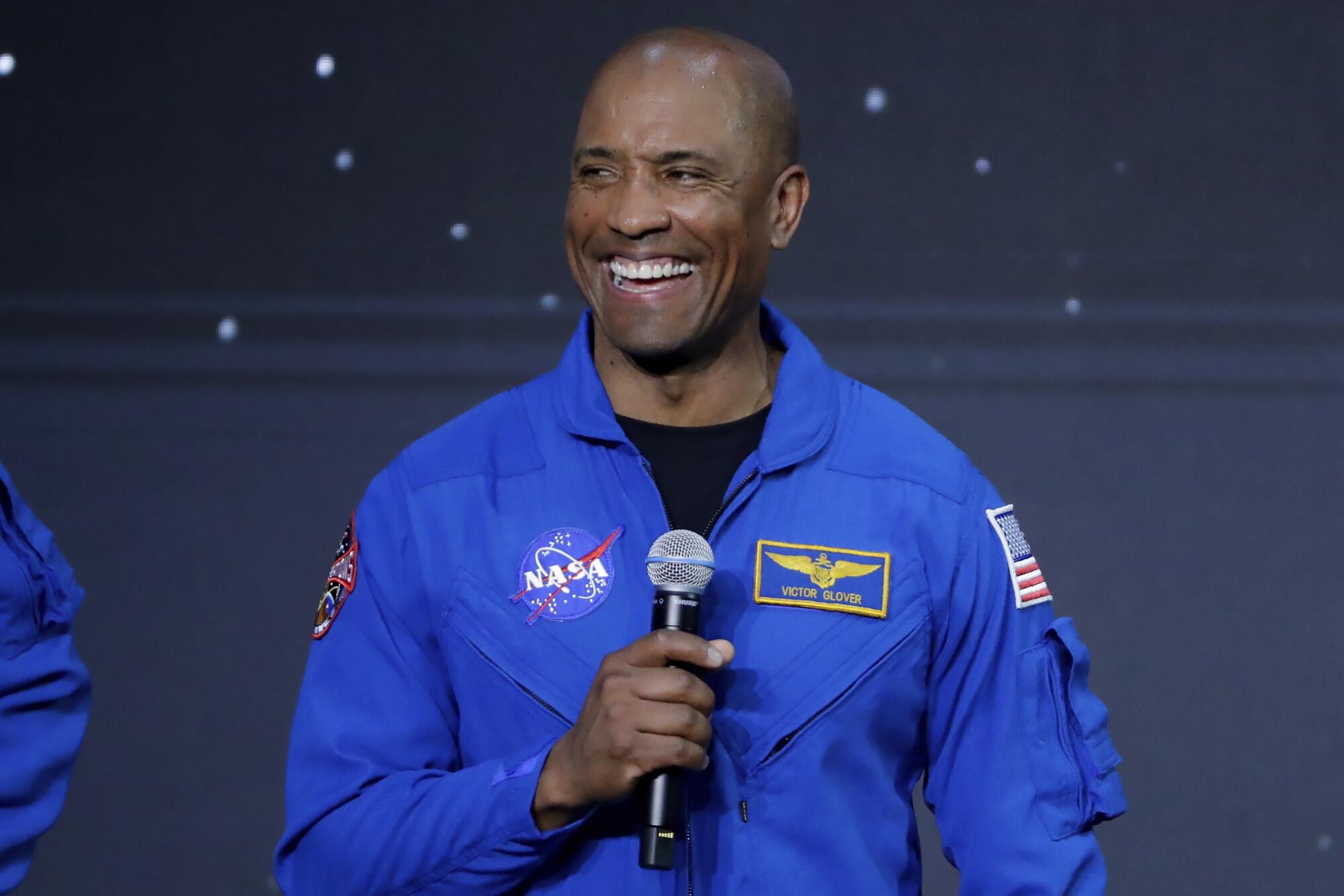 Victor Glover Jr. speaks after he was announced as mission pilot for the Artemis II lunar program. 