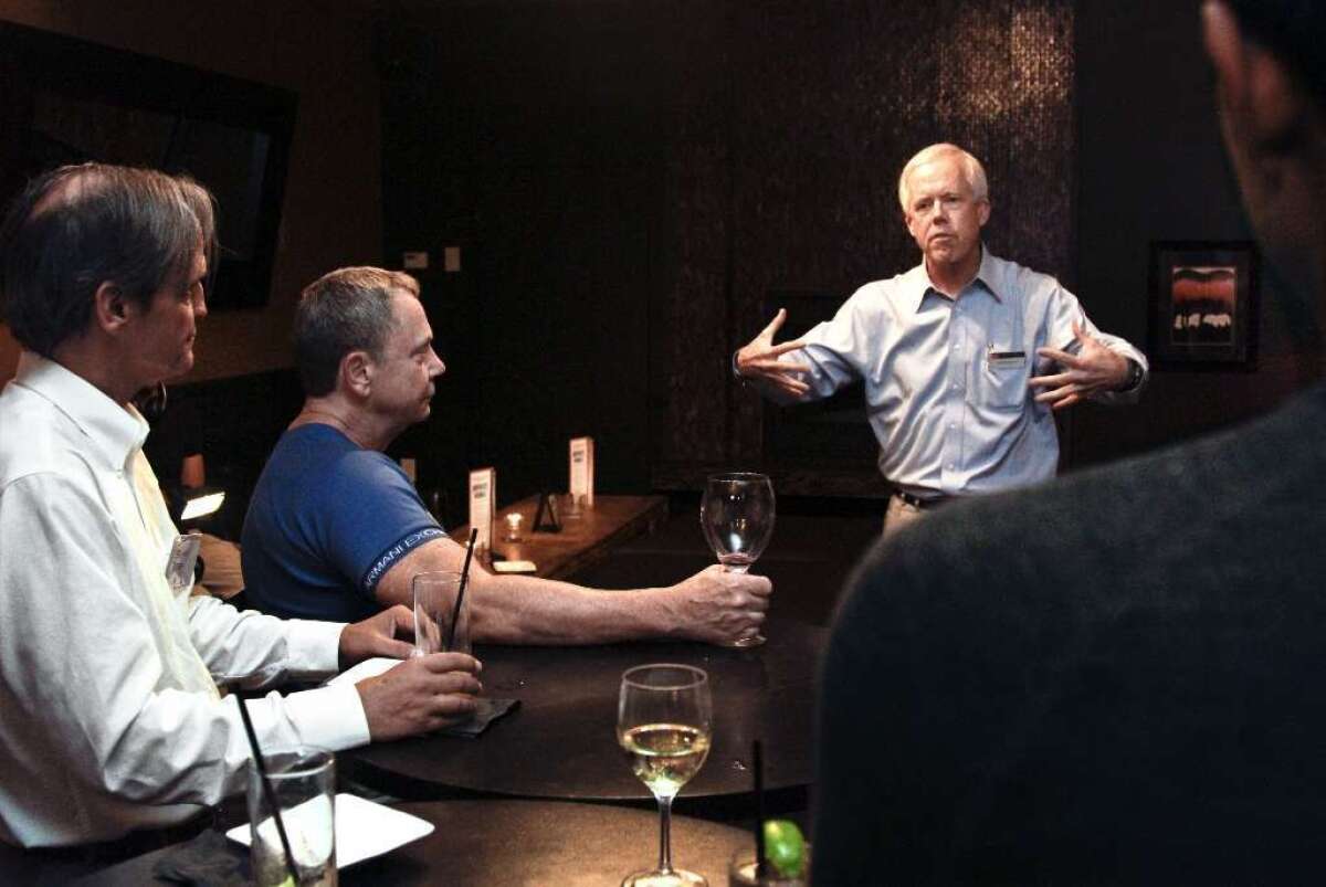 Businessman Bill Bloomfield, seen here meeting with members of the Log Cabin Republicans in 2012, has spent more than $1 million trying to elect Ben Allen to the state Senate.