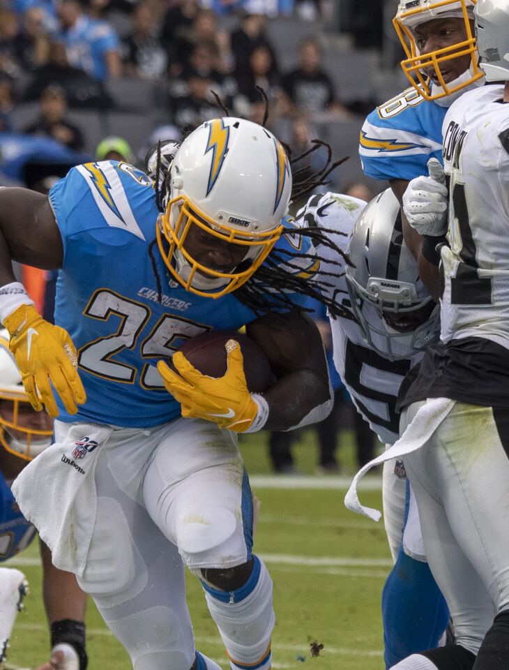 Chargers running back Melvin Gordon scores a touchdown against the Oakland Raiders in the second quarter.