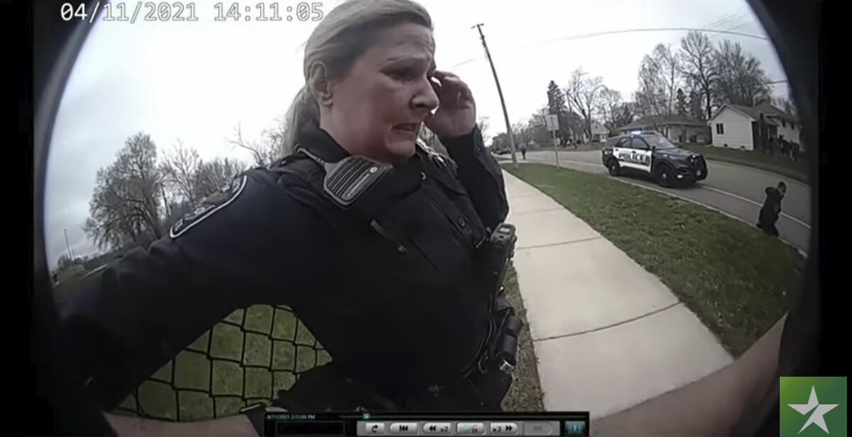In this screen grab police body cam video is shown in court on Friday, Dec. 10, 2021 at Hennepin County Courthouse in Minneapolis, Minn., former Brooklyn Center police Officer Kim Potter reacts after a traffic stop in which Daunte Wright was shot on April 11, 2021. Potter is charged with first- and second-degree manslaughter in the April 11 shooting of Wright, a 20-year-old Black motorist, following a traffic stop in the Minneapolis suburb of Brooklyn Center. (Court TV, via AP, Pool)