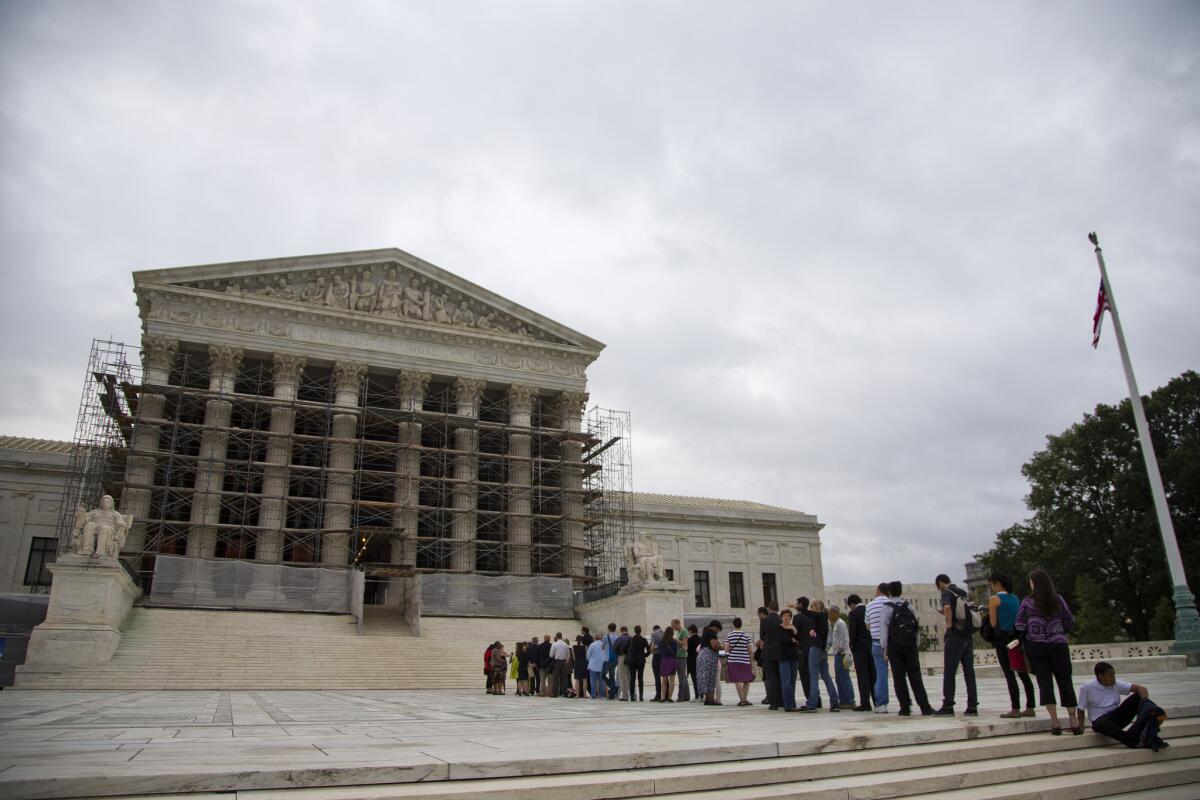 People waiting in line to enter the Supreme Court in Washington, D.C.
