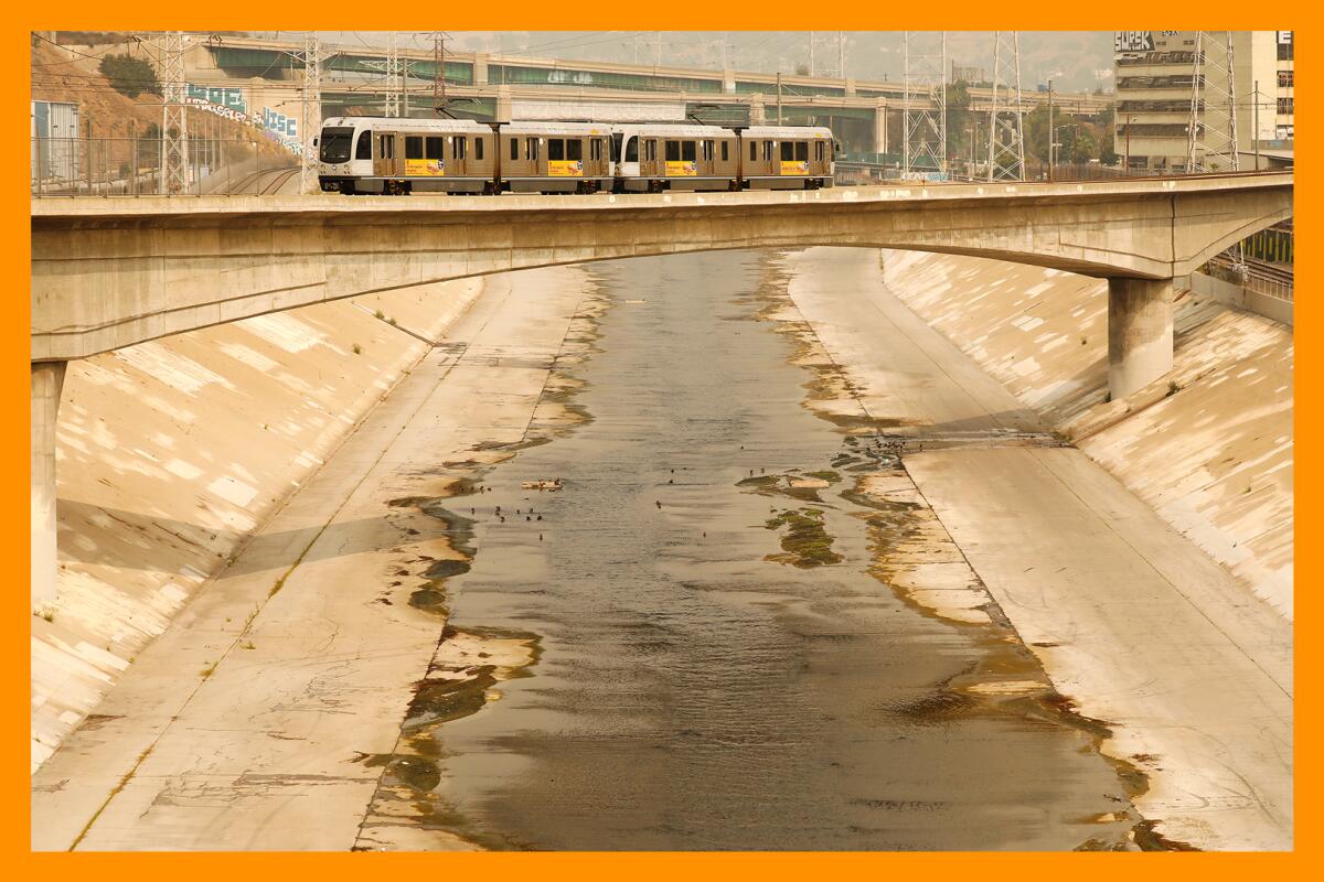 The cement-encased Los Angeles River spanned by a cement bridge