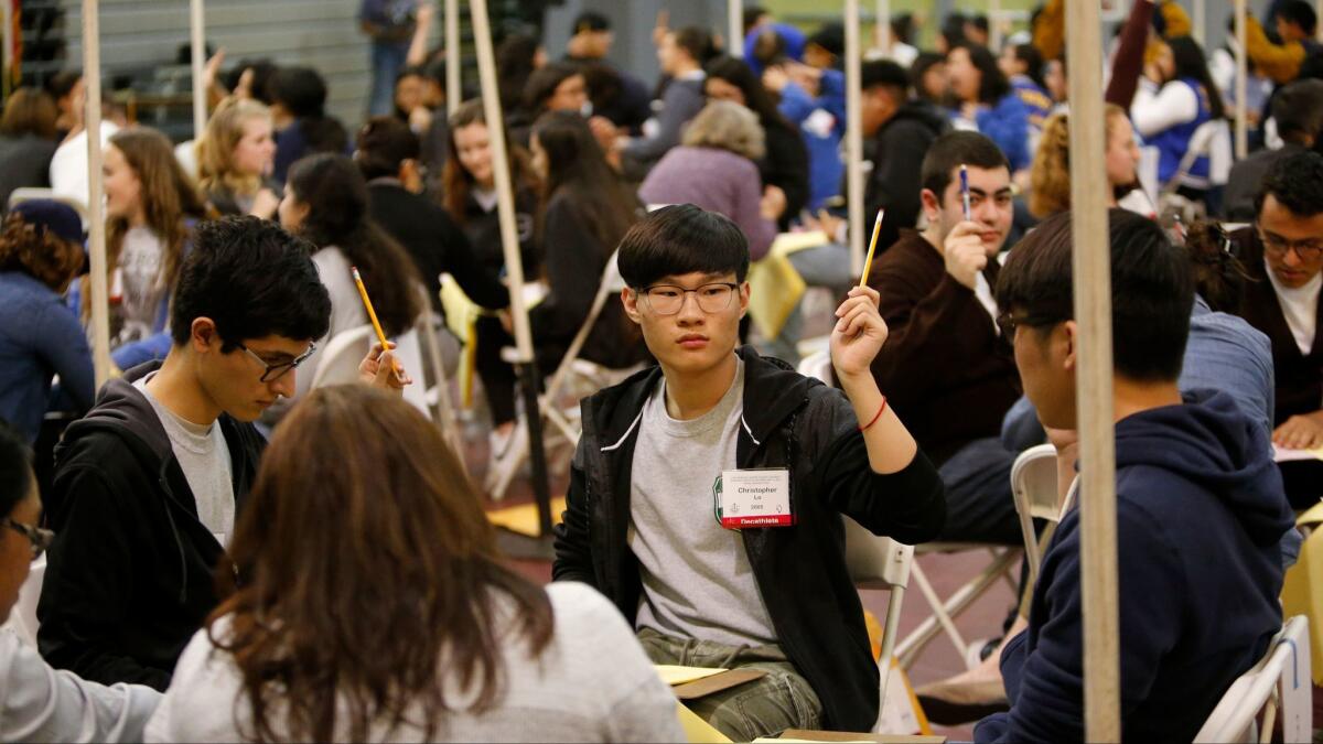 The team from Granada Hills Charter High School competes in the Super Quiz during the L.A. Unified academic decathlon in February in L.A. (Allen J. Schaben / Los Angeles Times)