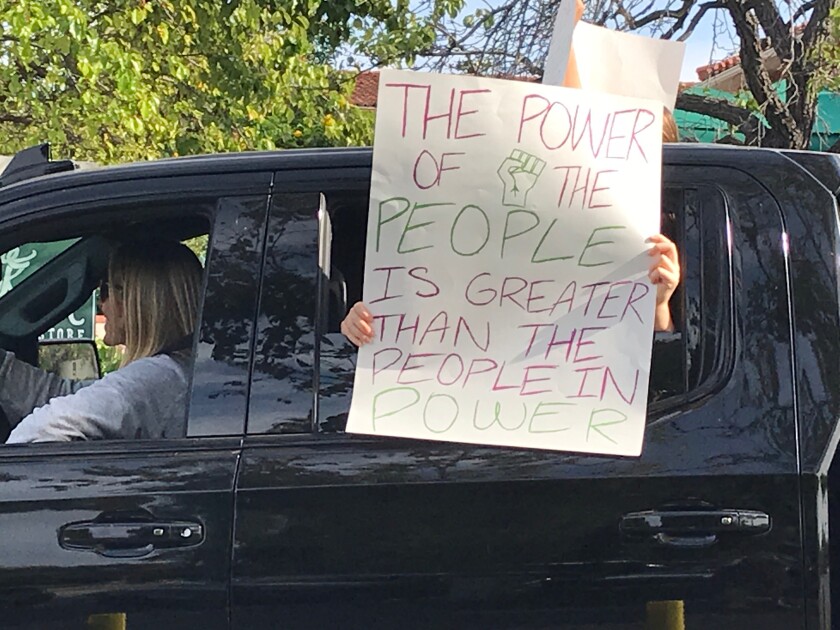 A protestor in a peaceful drive-through protest on June 2.