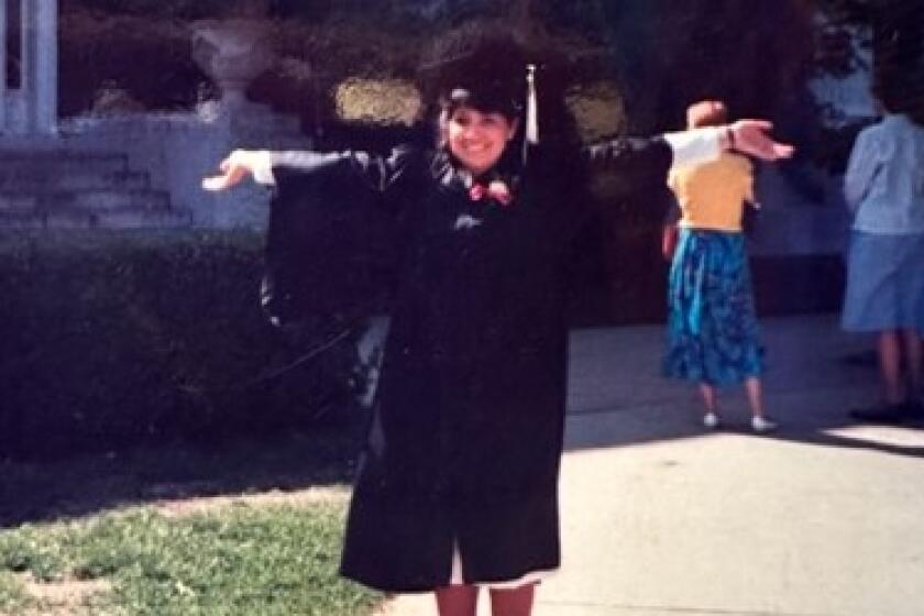 Laura Castañeda in the quad on graduation day at The University of Illinois Champaign-Urbana in 1987