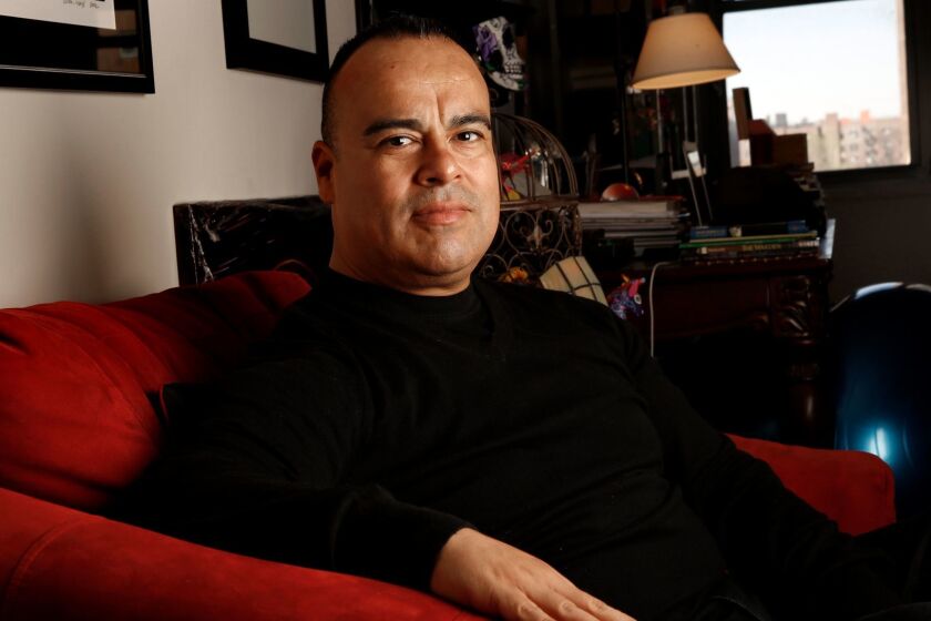 Rigoberto González at home in Queens, N.Y.