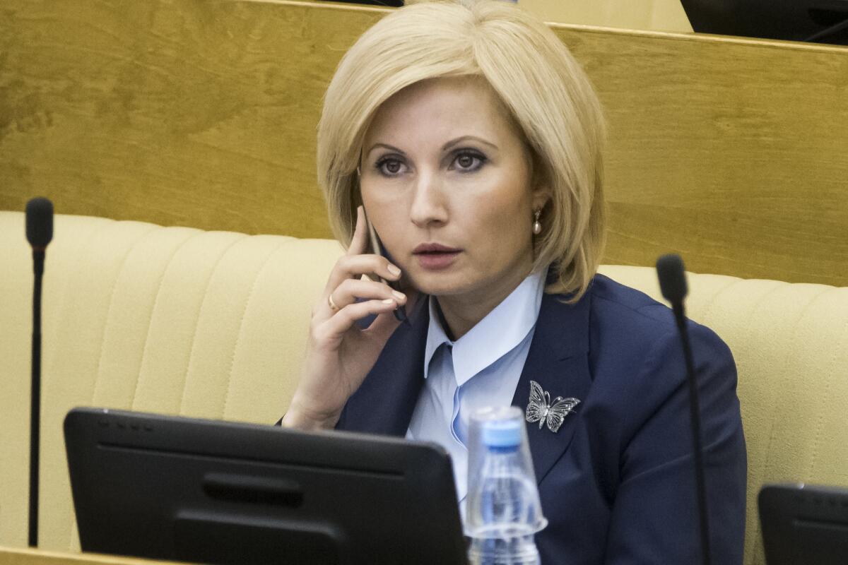 Russian lawmaker Olga Batalina, one of the bill's co-authors, speaks on a phone at the State Duma in Moscow on Friday.