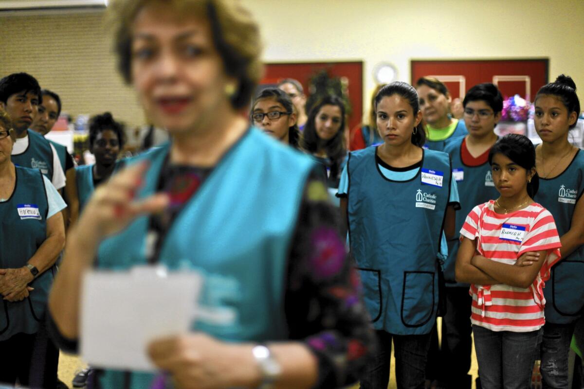 Volunteers receive an orientation at a church in Texas in July 2014. They had converged on south Texas to help immmigrants crossing the border.