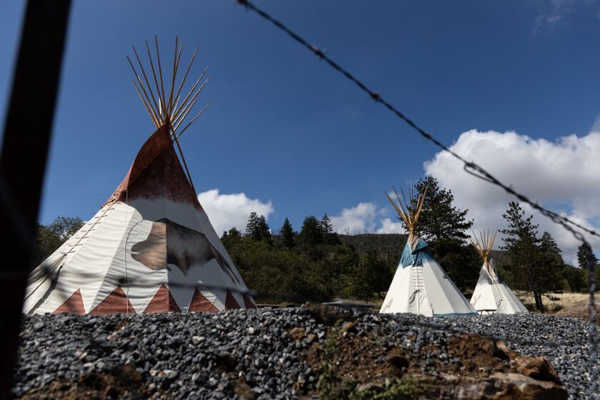 Tipis for camping stand at Lake Cuyamaca Recreation and Park District’s West Shore Campground in Julian on Tuesday, Sept. 13, 2022. Tribal members of the Iipay Nation of Santa Ysabel say the tipis are a sign of cultural appropriation.