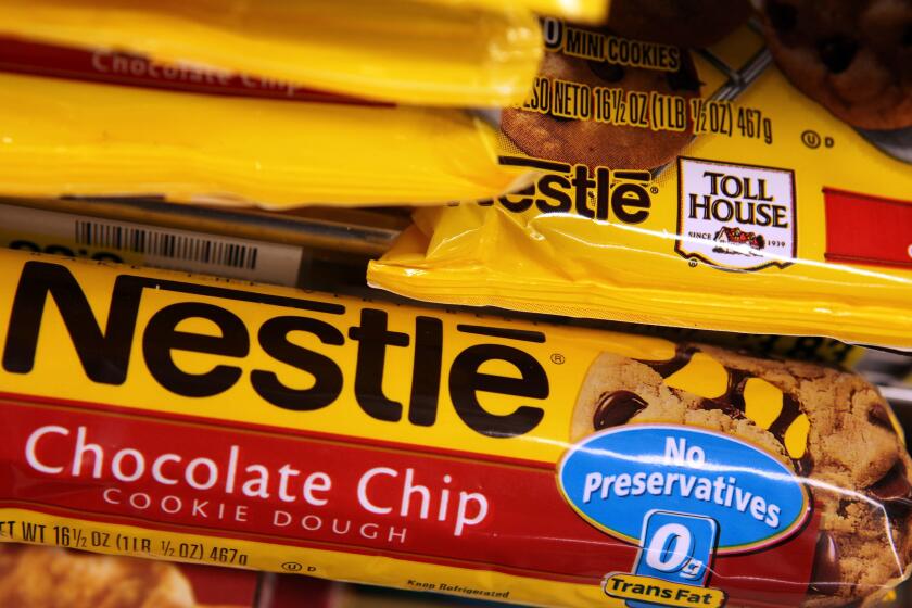 SAN FRANCISCO - JUNE 19: Packages of Nestle Toll House chocolate chip cookies are displayed on a shelf at Cal Mart Grocery June 19, 2009 in San Francisco, California. Nestle is voluntarily recalling its Toll House refrigerated cookie dough products after the Food and Drug Administration issued a warning of possible E.coli contamination. (Photo by Justin Sullivan/Getty Images)