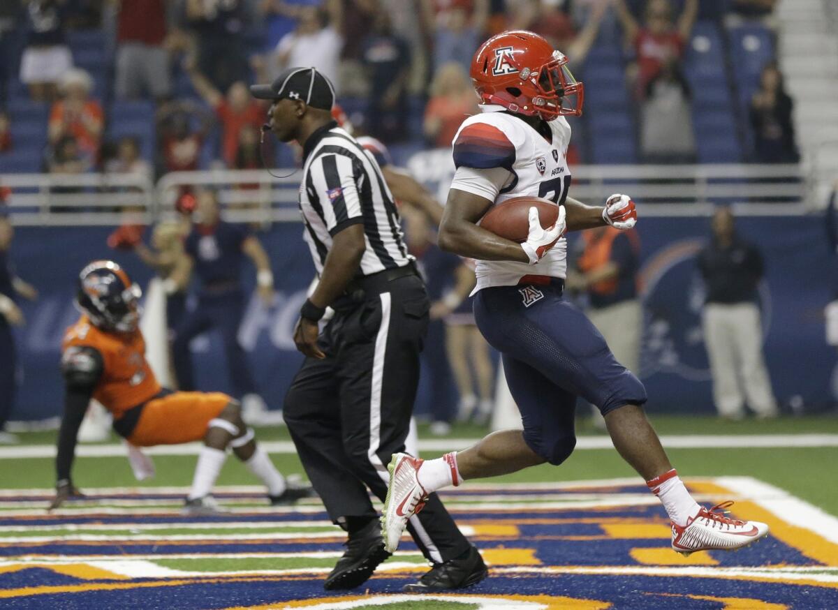 Arizona running back Nick Wilson runs into the end zone for a touchdown against UTSA in the second quarter of the Wildcats' 26-23 win Thursday over the Roadrunners.
