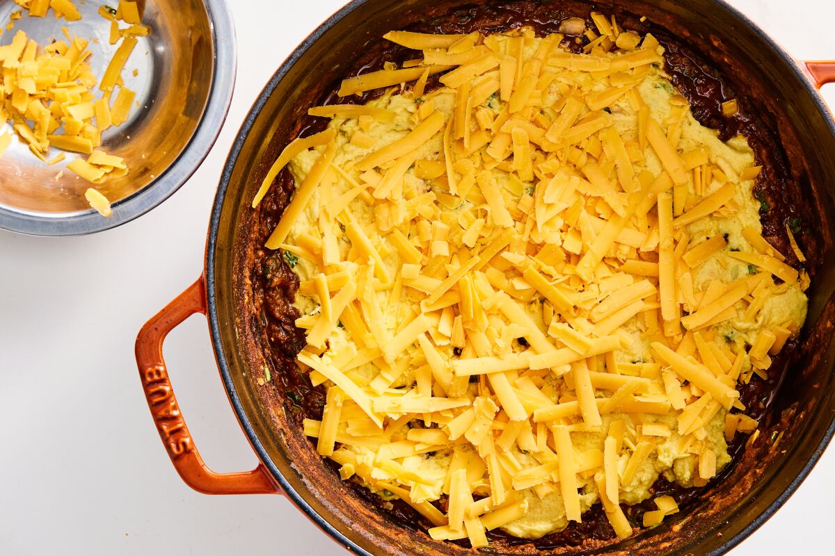 Grated cheddar tops the cornbread batter for a cheesy top in this tamale pie.