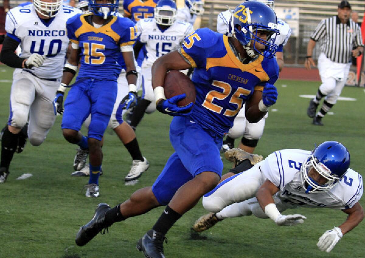 Crenshaw running back Jacob Knight turns the corner during a game against Norco.