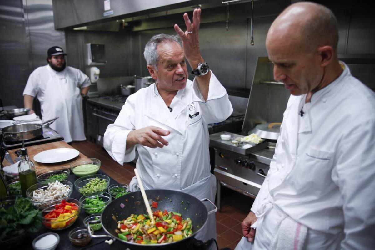 Wolfgang Puck will have a busy Sunday.