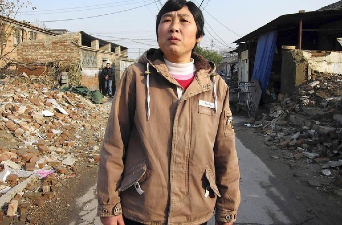 Liu Siping, a 50-year-old migrant, lives in a semi-demolished neighborhood on the outskirts of Beijing. Her rural residency permit, or hukou, limits her access to jobs and social services in cities.