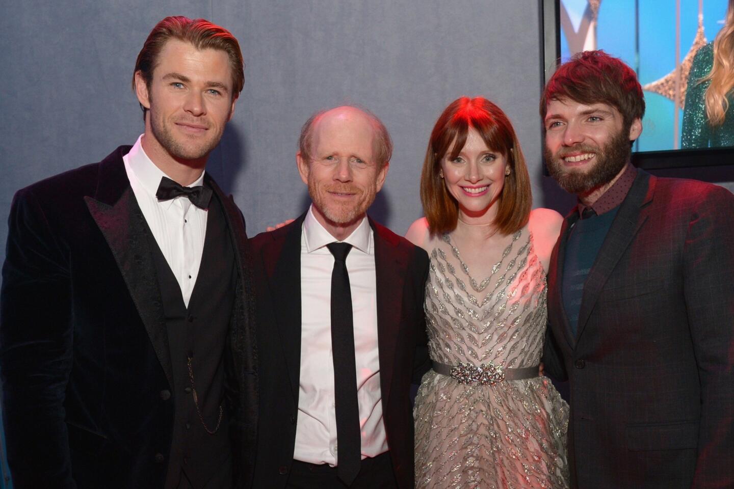 "Rush" actor Chris Hemsworth, left; director Ron Howard; his daughter, "Twilight" actress Bryce Dallas Howard; and her husband, "Fringe" actor Seth Gabel.