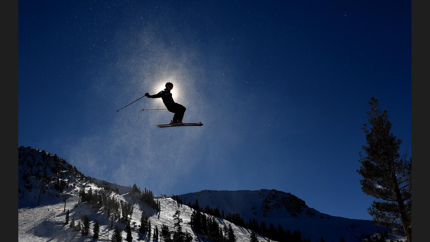 A competitor warms-up before the start of the men's slopestyle qualifier in Mammoth Mountain on Saturday.