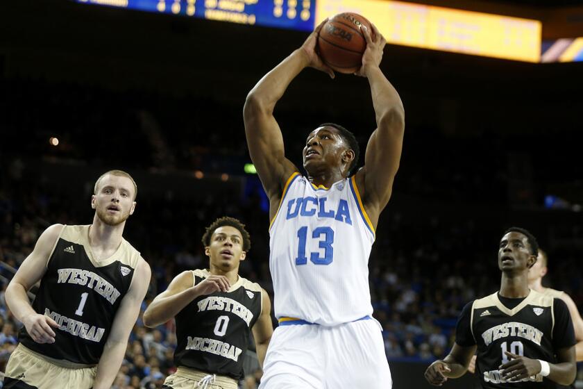 UCLA forward Ike Anigbogu (13) drives to the basket against Western Michigan in the first half at Pauly Pavillion.