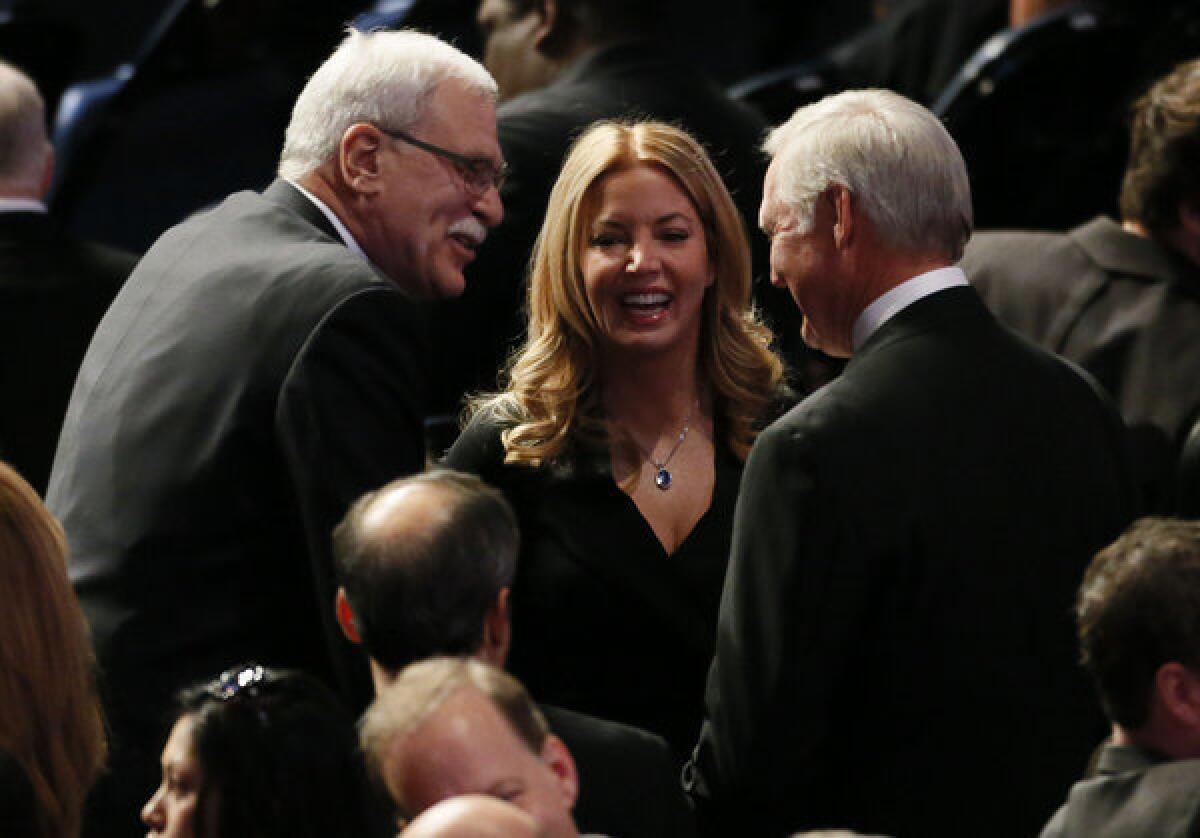 Phil Jackson, Jeanie Buss and former Lakers great Jerry West exchange greetings at Lakers owner Jerry Buss' memorial service in February.