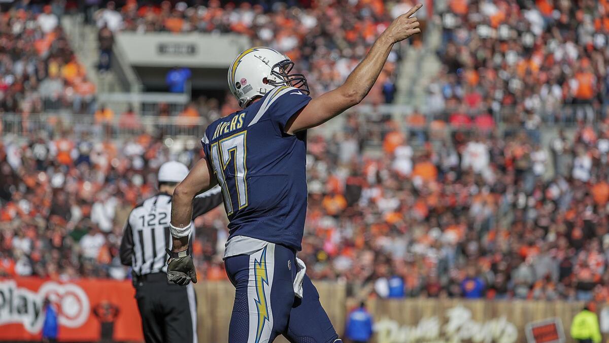 Chargers quarterback Philip Rivers celebrates after hooking up with receiver Tyrell Williams on a 29-yard touchdown pass in the third quarter against the Cleveland Browns on Oct. 14.