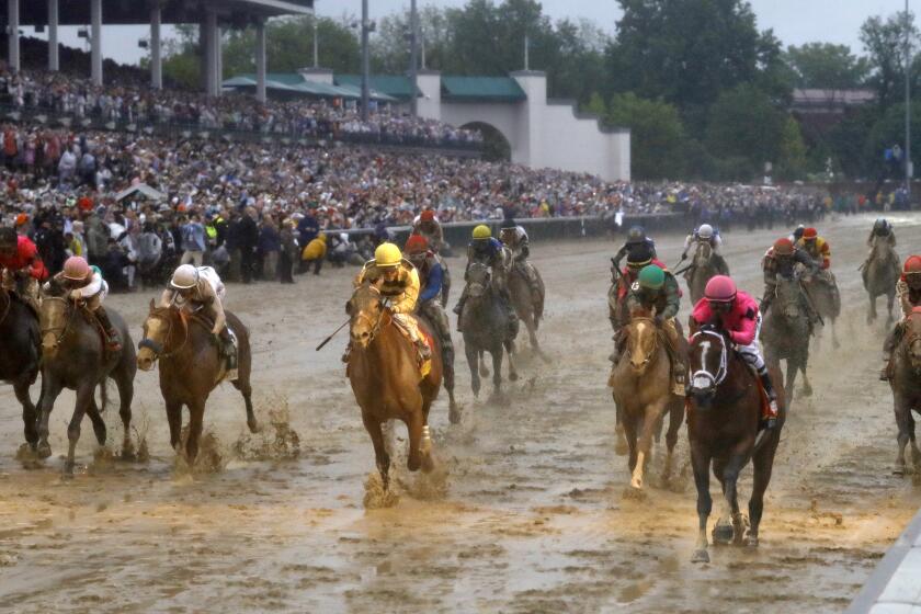 Luis Saez rides Maximum Security across the finish line first followed by Flavien Prat on Country House during the 145th running of the Kentucky Derby horse race at Churchill Downs Saturday, May 4, 2019, in Louisville, Ky. Country House was declared the winner after Maximum Security was disqualified following a review by race stewards. (AP Photo/Matt Slocum)