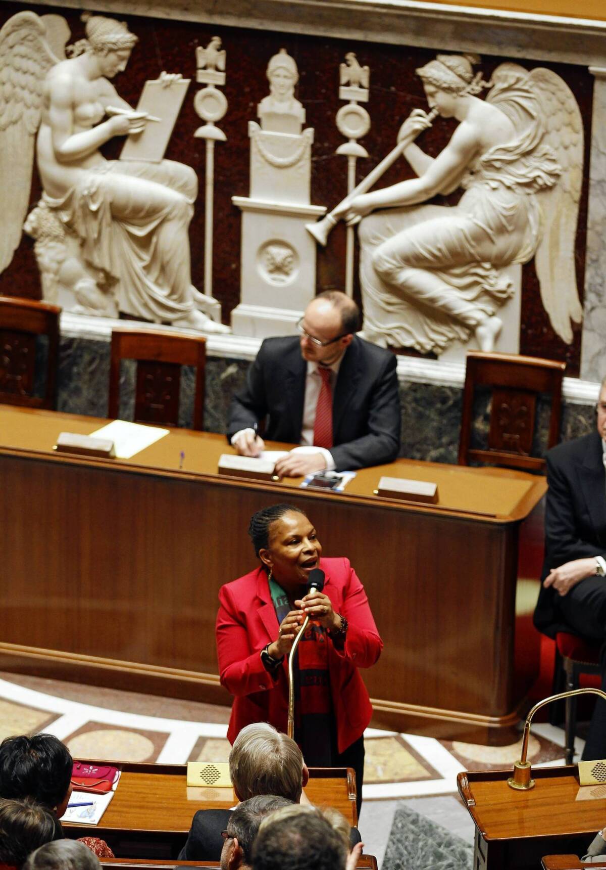 French Justice Minister Christiane Taubira speaks after National Assembly lawmakers voted on a bil that would legalize same-sex marriage.