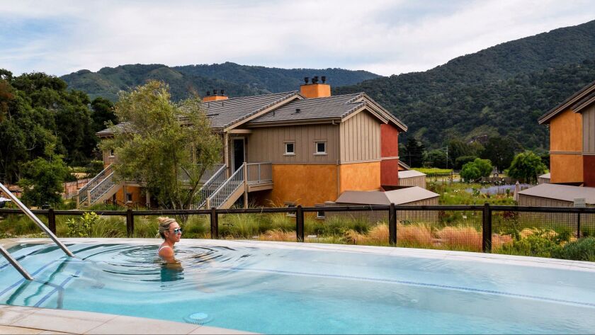 The infinity-edge spa at Bernardus Lodge & Spa in Carmel Valley overlooks the beautiful grounds and nearby mountains.