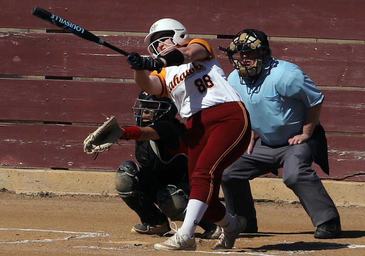 Ocean View's Sydney Fullbright (88) gets a hit against Garden Grove on Friday in a Golden West League game.