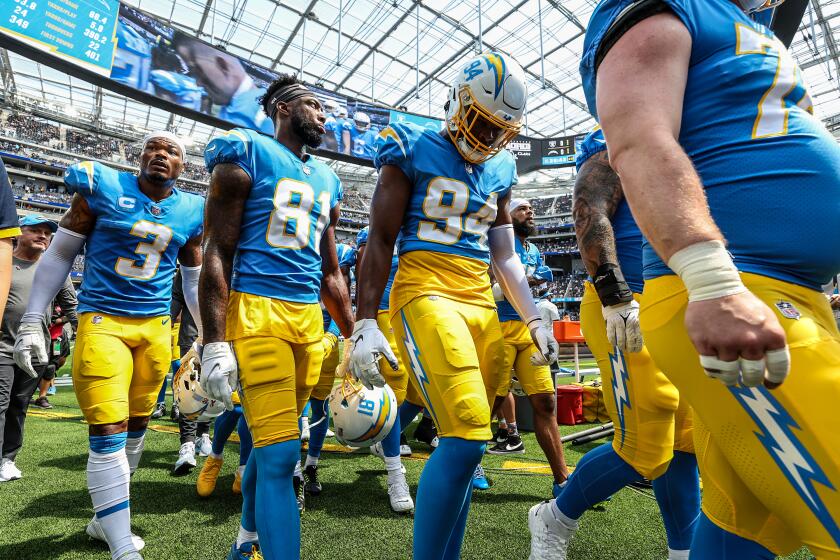Inglewood, CA, Sunday, September 11, 2022 - Chargers players head to the locker room.