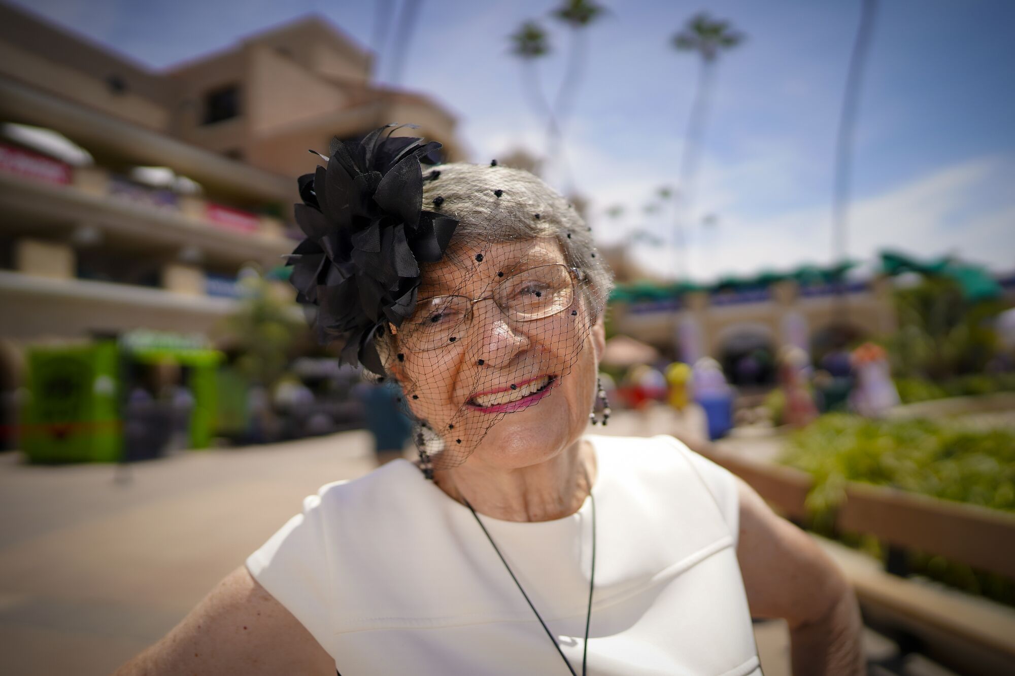 Sue Hensley from El Cajon was among the race fans taking part in the tradition of wearing hats on opening day.