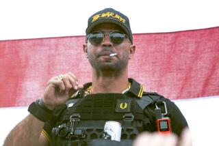 FILE - Proud Boys leader Henry "Enrique" Tarrio wears a hat that says The War Boys during a rally in Portland, Ore., Sept. 26, 2020. A federal jury is set to hear closing arguments in the historic trial of Proud Boys extremist group leaders charged with plotting to use force to keep former President Donald Trump in power. Starting Monday, April 24, 2023, prosecutors and defense lawyers will make their final appeals to jurors who will decide the fate of former Proud Boys national chairman Enrique Tarrio and four lieutenants. (AP Photo/Allison Dinner, File)