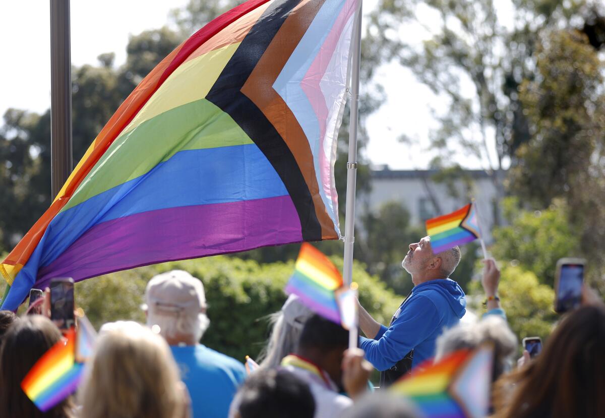 Voters in a California beach town approve an LGBTQ Pride flag ban