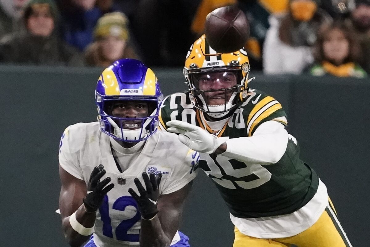 Green Bay Packers' Rasul Douglas breaks up a pass intended for Los Angeles Rams' Van Jefferson during the second half of an NFL football game Sunday, Nov. 28, 2021, in Green Bay, Wis. (AP Photo/Morry Gash)