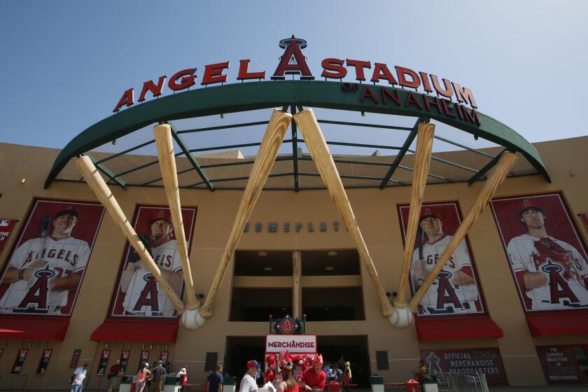 The Angels, frustrated by talks with Anaheim over plans to keep the team at Angel Stadium, above, have met with the developer of the Orange County Great Park property to see whether the construction of a new ballpark might be feasible on the Irvine site.