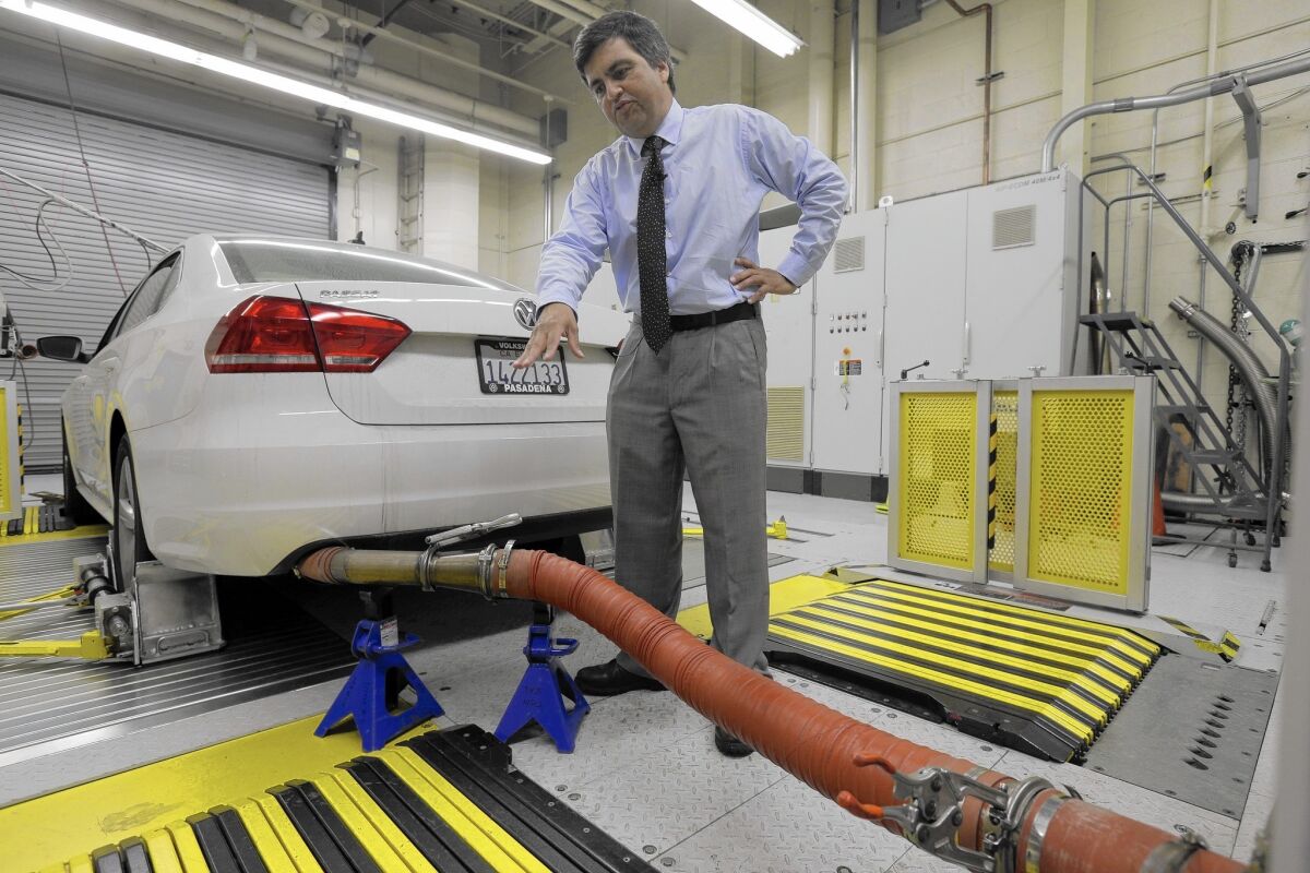 John Swanton, spokesman for the California Air Resources Board, with a diesel-powered 2013 Volkswagen Passat at the emissions test lab in El Monte.