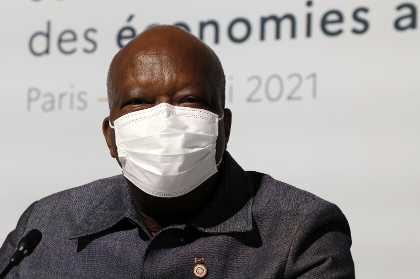 Burkina Faso's President Roch Marc Christian Kabore poses at the Summit on the Financing of African Economies