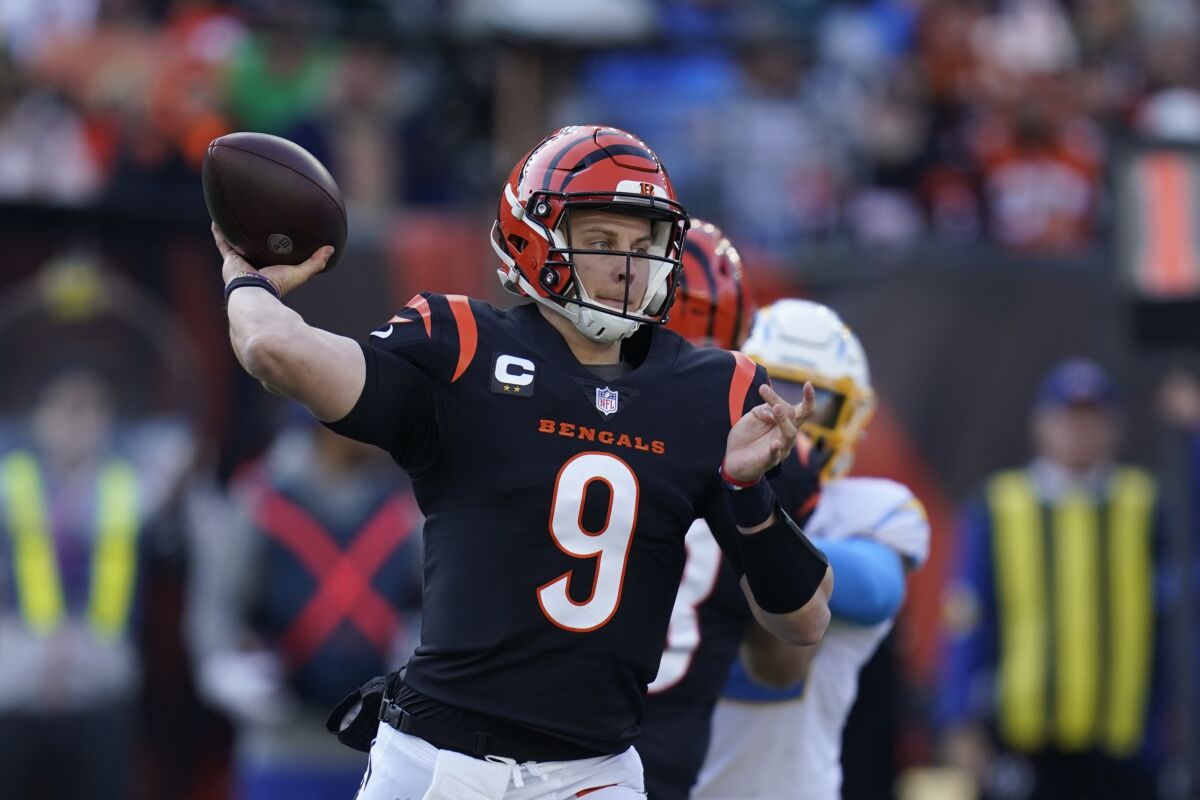 Cincinnati Bengals quarterback Joe Burrow throws during the first half against the Chargers.