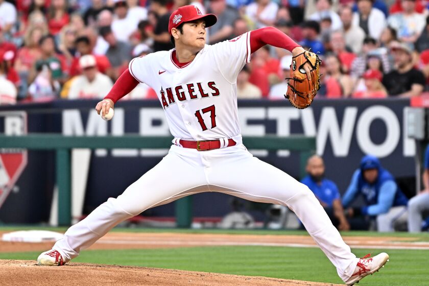Anaheim, California June 22, 2022-Angels pitcher Shohei Ohtani throws a pitch against the Royals in the first inning at Angel Stadium of Anaheim Wednesday. (Wally Skalij/Los Angeles Times)