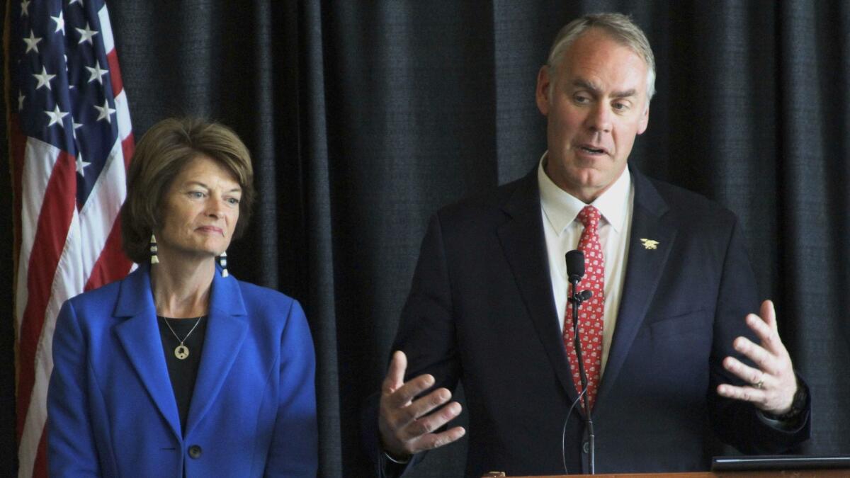 Interior Secretary Ryan Zinke with Alaska Sen. Lisa Murkowski at a news conference in Anchorage on May 31, 2017.