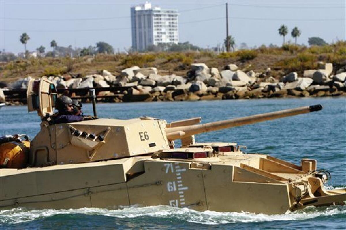 This Oct. 9, 2008 photo provided by the U.S. Marines photos shows an Expeditionary Fighting Vehicle (EFV) entering the water to execute test exercises off the coast of Marine Corps Base Camp Pendleton, Calif. The Marine Corps and contractor General Dynamics Corp. face a critical test. A failure this week for the vehicles designed to replace a Vietnam-era fleet could doom the $27 billion program. (AP Photo/Pvt. Daniel Boothe, U.S. Marines)