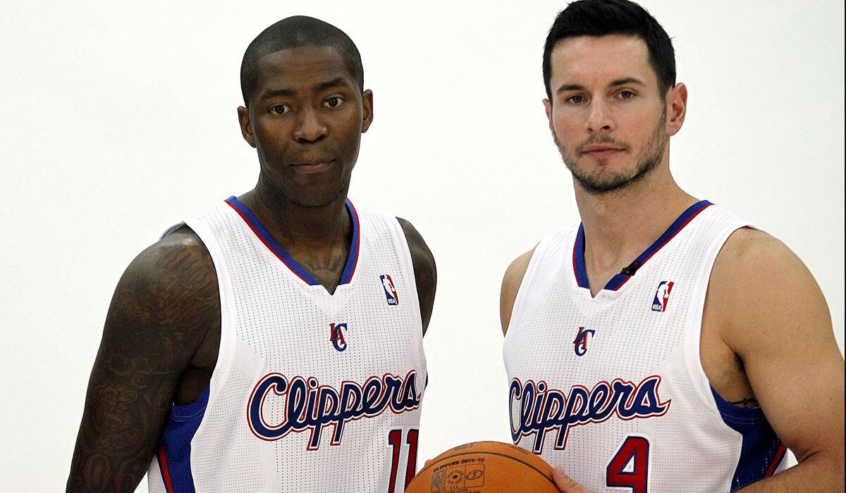 Jamal Crawford, left, and J.J. Redick pose for a photo during media day at the Clippers training center in Playa Vista on Sept. 30, 2013.