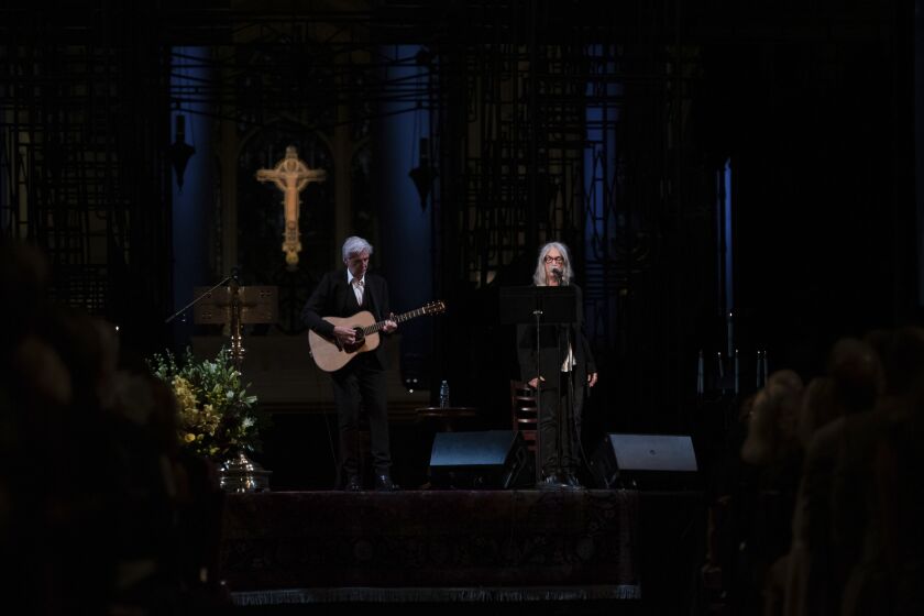 Patti Smith, right, attends the Joan Didion celebration of life event on Wednesday, Sept. 21, 2022, at the Cathedral of St. John the Divine in New York. (Photo by Christopher Smith/Invision/AP)