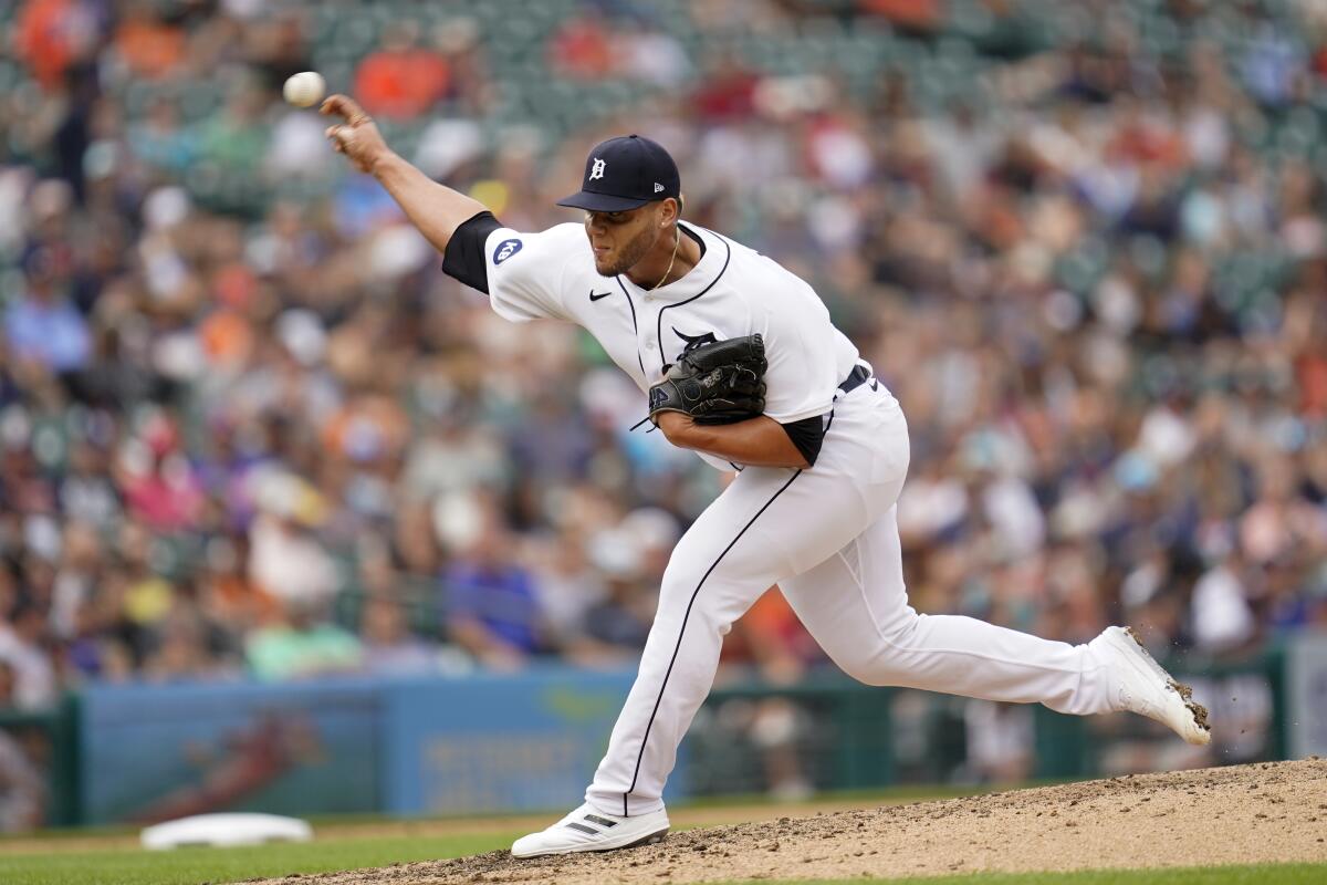 Detroit Tigers relief pitcher Joe Jimenez throws against the Los Angeles Angels in the eighth inning of a baseball game in Detroit, Saturday, Aug. 20, 2022. (AP Photo/Paul Sancya)